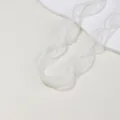 Close-up detail of white sheer ribbon with pearl edge for DIY hair bows and cake decoration. - 1 Meter Pack / Off White