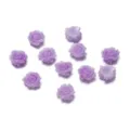 Primo piano di cabochon di rose in resina viola, perfetti per nail art e lavori fai da te. - Viola