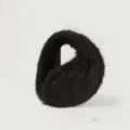 Close-up detail view of black plush earmuffs, fluffy winter ear warmers for cold weather use. - One Size / Black