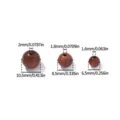 Detailed close-up view showing dimensions and hole sizes of natural wooden round beads. - 50 Pieces/Pack / 6-6.5mm