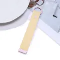 Yellow woven strap keychain with pink metal hardware, minimalist bag pendant detail view. - F10 Light Yellow Rope Pink Buckle / 1 Piece