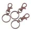 Brown zinc alloy lobster claw clasps with split rings, perfect for DIY bag charms and keychains. - 5 Pieces/Pack / Coffee