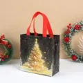 Bolsa de mano navideña de tela no tejida gruesa con árbol dorado, ideal para regalos festivos. - Árbol de Navidad / 22x23x11cm