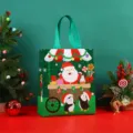 Bolsa de regalo navideña de tela no tejida con lindo Papá Noel y pingüino para festividades. - Verde