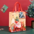 Bolsa de mano no tejida de Navidad con bonito estampado de Papá Noel para regalos - 26*32*10cm / Rojo