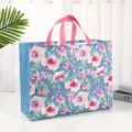 Bolsa de compras no tejida con estampado floral y asas rosas, elegante empaque regalo. - Floral Azul