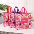 Reusable floral non-woven shopping gift bag with sturdy handles for packaging and retail. - Style 1