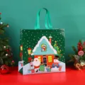 Christmas non-woven gift tote bag with Santa Claus and tree design for holiday shopping events. - Green House