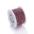 Close-up detail of the colorful braided cord spool with metallic gold thread for DIY jewelry crafts. - 2mm Braided Cord with Gold Thread, B07