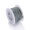 Colorful braided cord with metallic gold wire on a white spool, perfect for DIY bracelets. - 2mm Braided Metallic Cord - B08
