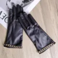 Black leather gloves for women warm winter gloves with stylish gold chain cuff detail. - One Size / Black