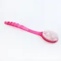 Long handle bath brush for body scrubbing, pink translucent design with soft white bristles. - Transparent Bath Brush - Red