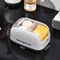 Makeup sponge storage box, white partitioned cosmetic puff holder with clear dustproof lid. - Clear