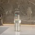 Portable travel mouthwash cup toothbrush holder set for bathroom home storage and organization. - Transparent White
