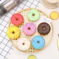 Detailed view of colorful PU simulation sprinkled donuts arranged on a bamboo tray prop. - Fridge Magnet (Magnetic Back) / 7pcs/Set / Sprinkle Doughnut - Set of 7