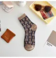 Retro ethnic style women's mid-tube socks featuring 3D floral relief in chic brown autumn design. - One Size / Purple and Khaki