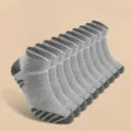Detail view of grey men's sports running socks with thick towel bottom and breathable design. - One Size / Gray