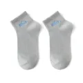 Grey ankle socks for men and women featuring a stylish mountain graphic and embroidered logo. - One Size / Gray