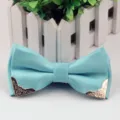Men's light blue jacquard bow tie with silver dots and gold metal corners for formal wear. - Lake Blue