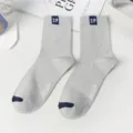 Men's gray ribbed mid-calf cotton socks with SP patch and athletic design for daily wear. - One Size / Light Gray