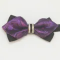 Close-up view of the purple paisley bow tie featuring sparkling rhinestone center ring. - LJ-ZJ14