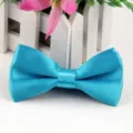 Farfallino da bambino in poliestere lucido tinta unita, cravatta blu moda elegante. - Blu lago