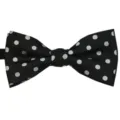 Detailed view of classic black bow tie featuring elegant white polka dots for children. - Style 17