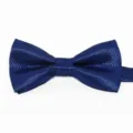 Farfallino blu con motivo a quadri in tessuto jacquard di poliestere fine per bambini ed eventi. - Blu Zaffiro
