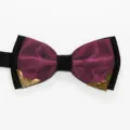 Close up detail of mens purple black bow tie with metallic corners for formal wedding wear - Fuschia