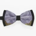 Close-up detail of the elegant purple and black bow tie featuring vintage metal corner accents. - Light Purple