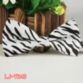 Schwarz-weiße Zebra-Fliege für Herren, modischer Polyester-Stoff für Partys und Hochzeiten. - Zebramuster