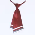 Close-up detail of the Korean style double-layer knife-shaped tie with stripe design. - Burgundy