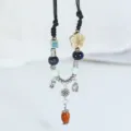 Retro Chinese style ceramic beaded sweater chain necklace with elegant ethnic pendant. - Drunken Dream