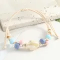 Handcrafted ceramic sea fish beaded bracelet with colorful ceramic beads and braided cord. - Electroplated Flat Fish Beige Style