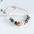 Handgemachtes Keramik Holzperlen Armband, verstellbare geflochtene Kordel Variante für Alltag. - Kleine Kürbisperlen (Rosa)