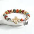 Colorful ceramic beaded bracelet with cross charm and silver butterfly pendant, ethnic style. - CS020 Lovesickness Story