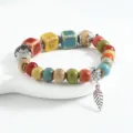 Colorful ceramic bead bracelet variant with leaf pendant, ethnic style fashion jewelry. - CS022 Waiting for the Wind