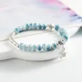 Blue and white ceramic bead bracelet with star pendant and silver curved tube variant. - Iridescent Blue Willow Silk