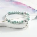 New Chinese style ceramic bead bracelet with macaron green beads and cute star charm variant. - Iridescent Green Willow Silk