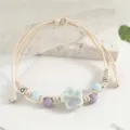 Handcrafted ceramic flower braided bracelet, minimalist vintage rope wristband for women. - Double Plum Blossom Blue and Beige