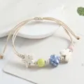 Sweet ceramic bead braided bracelet with cute star butterfly and flower charms for women. - Star and Butterfly / Aquamarine