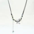 New Chinese style ceramic butterfly necklace with black cord, glazed beads and silver pendant. - Light Dust Ripples