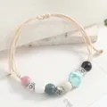 Ceramic woven bracelet with cute seashell and colorful beaded charms for women daily wear. - Clear Shell Cheese White