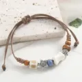 Woven ceramic beaded bracelet with wooden beads and silver star charm, bohemian style variant. - Radiant Shine