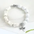 Vintage Chinese style white cracked bead bracelet with cute dragonfly pendant for charming women. - Camellia White Feather (White Crackle)