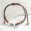 Handmade braided ceramic bead bracelet with elephant pendant adjustable cord jewelry - Elephant