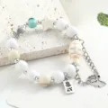 Nuovo braccialetto di perline in ceramica in stile cinese con ciondoli a stella e pesce. - Doppia coda di pesce (crepato bianco)
