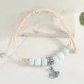 Fresh ceramic beaded woven bracelet for women, minimalist style with cute ginkgo leaf pendant. - Light Blue Abacus Bead - Fishtail