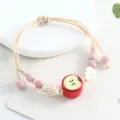 Handmade ceramic apple bracelet with woven cord, cute student style jewelry gift for girls. - Peace Leaf