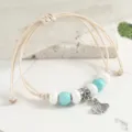 Chic ceramic woven bracelet with turquoise beads and ginkgo leaf charm for women daily wear. - White Abacus Beads Fishtail